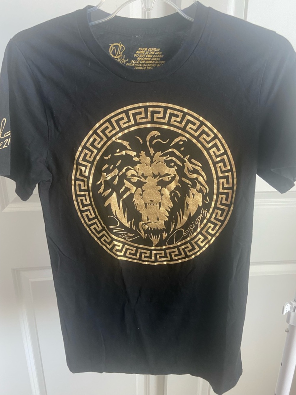 Black Short Sleeve Tee with Gold Lion Medallion
